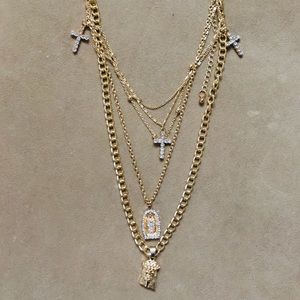 2 pairs of earrings and 1 necklace.